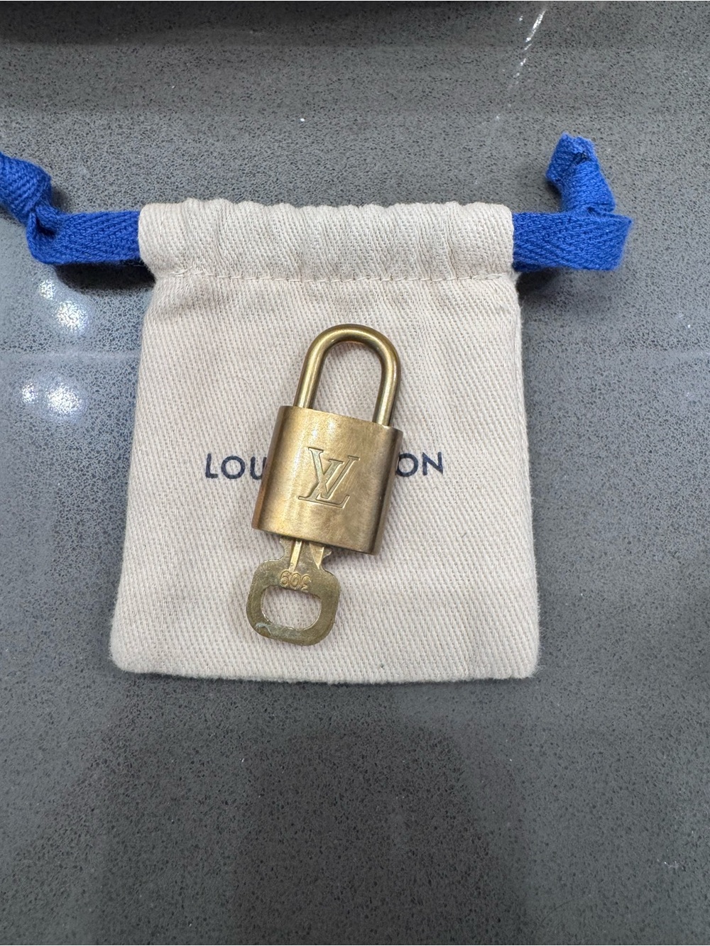 Louis Vuitton Vintage Gold Padlock with Key